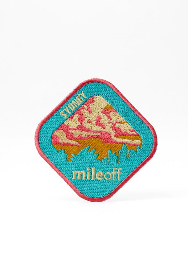 Colorful patch with 'Sydney mileoff' text on a white background