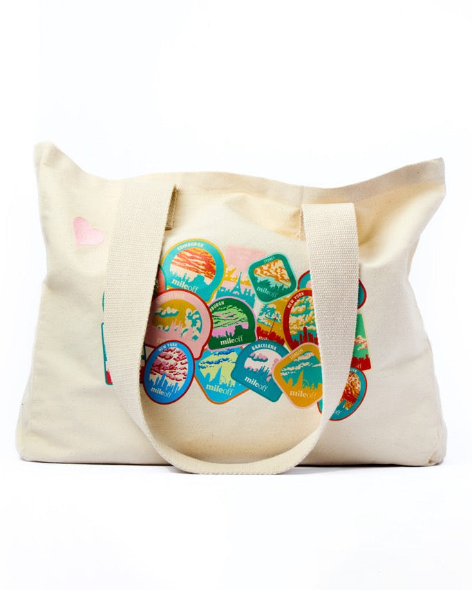 Canvas tote bag with colorful design on a white background